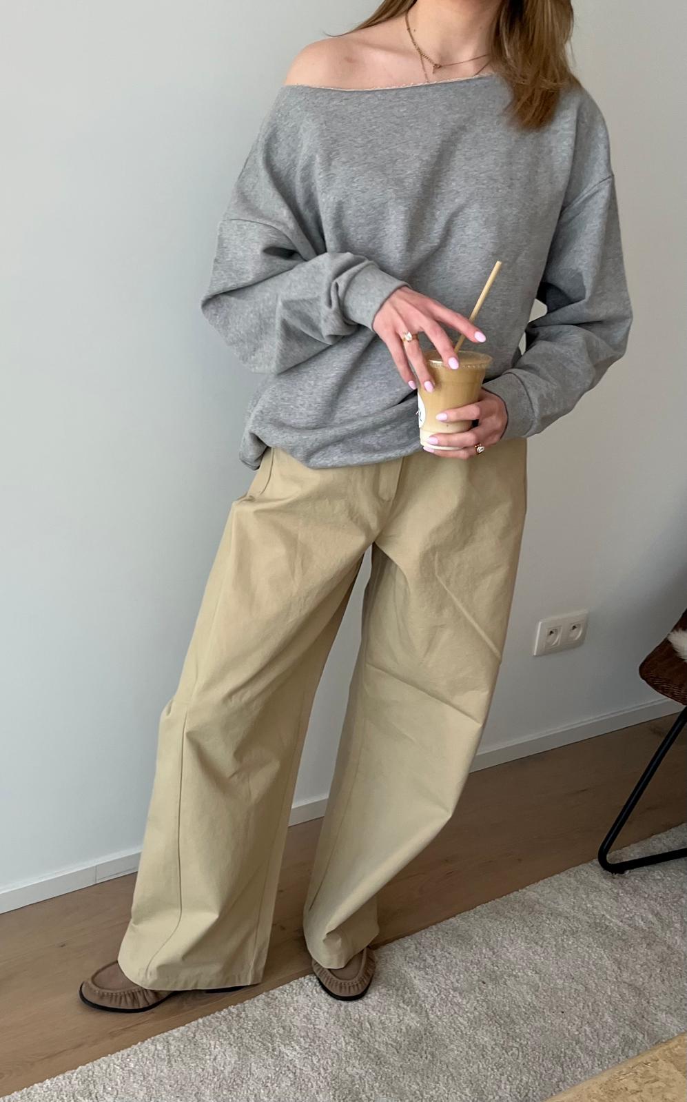 Spring outfit with grey sweater and beige balloon trousers